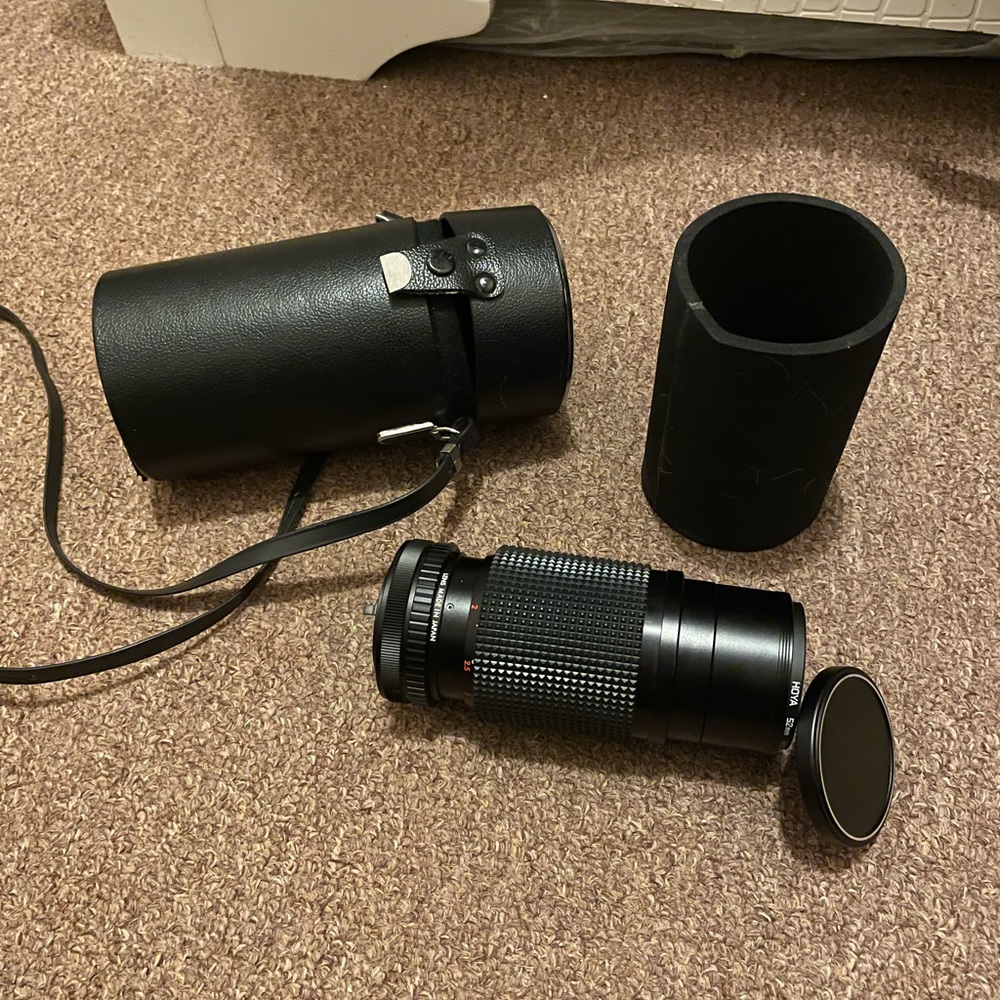 auto rakunar camera lens with hoya 52mm lens